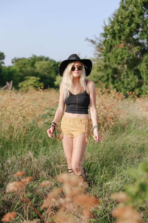 crop top hat and suede shorts